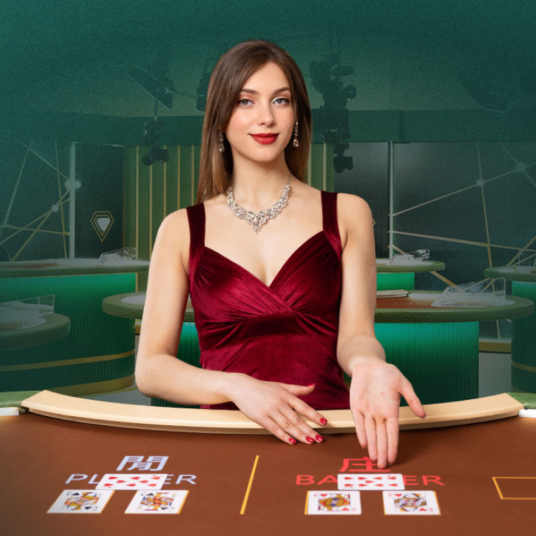 Image for an online casino game featuring a female dealer in a red dress at a gaming table. She is positioned in front of cards, with labels 'PLAYER' and 'BANKER' visible on the table. The background shows a stylish casino setting.